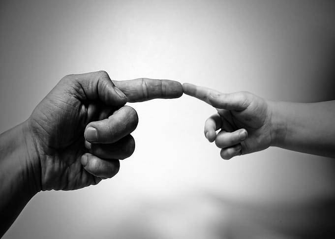 Hands of father and son