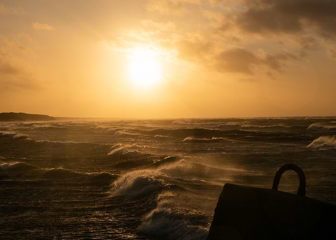 Sunset And The Sea