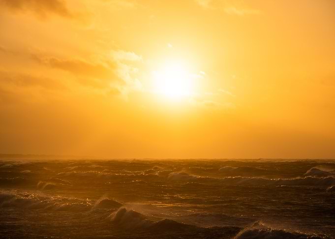 Sunset And The Sea
