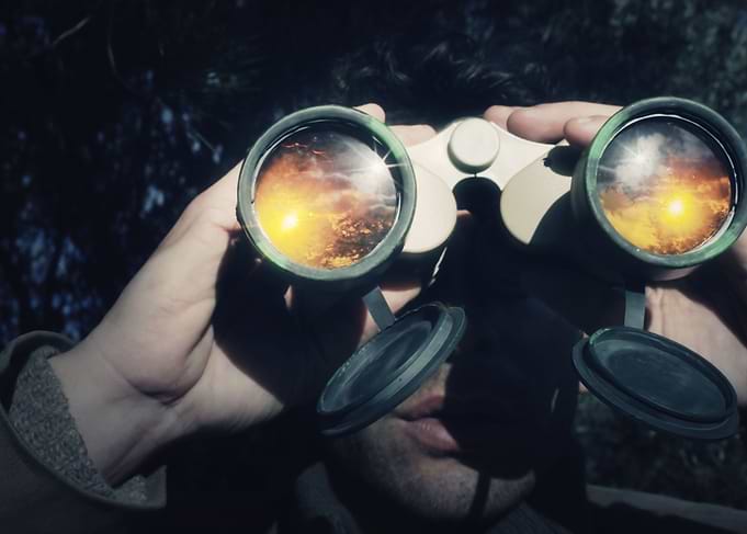 Man with binoculars