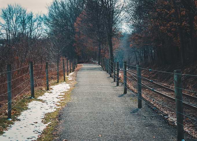 Walking down a winter trai
