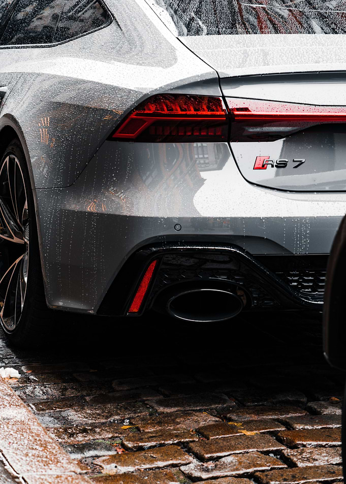 Gray Audi RS7 in rain