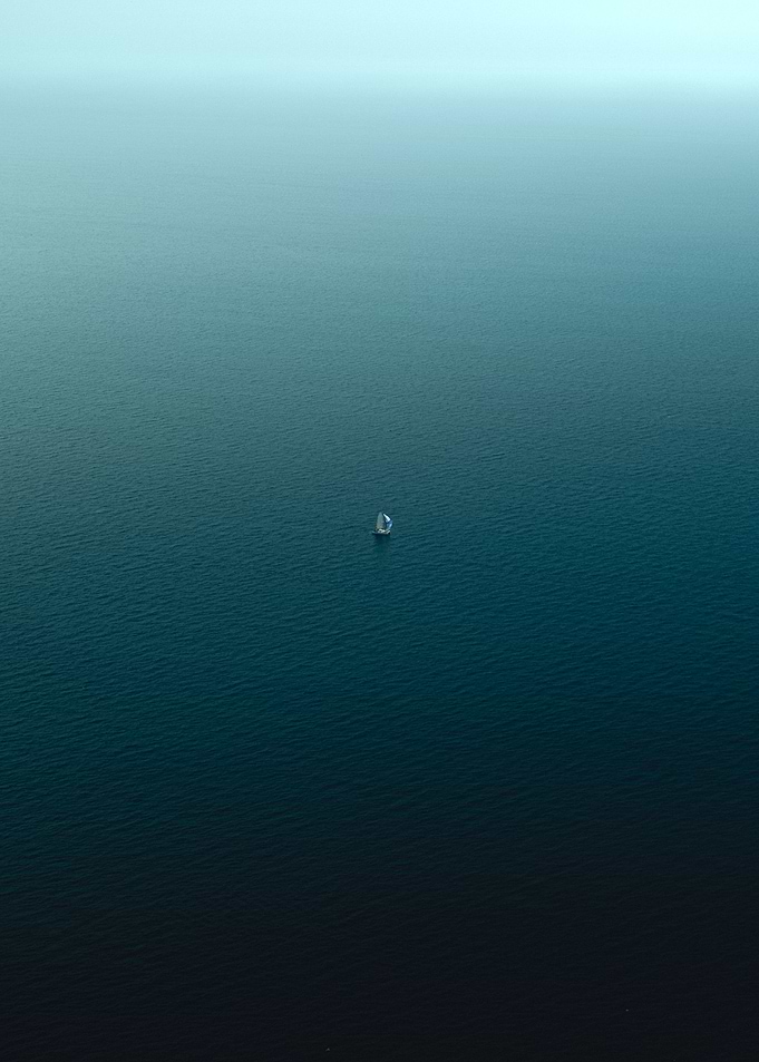 Tiny boat sailing
