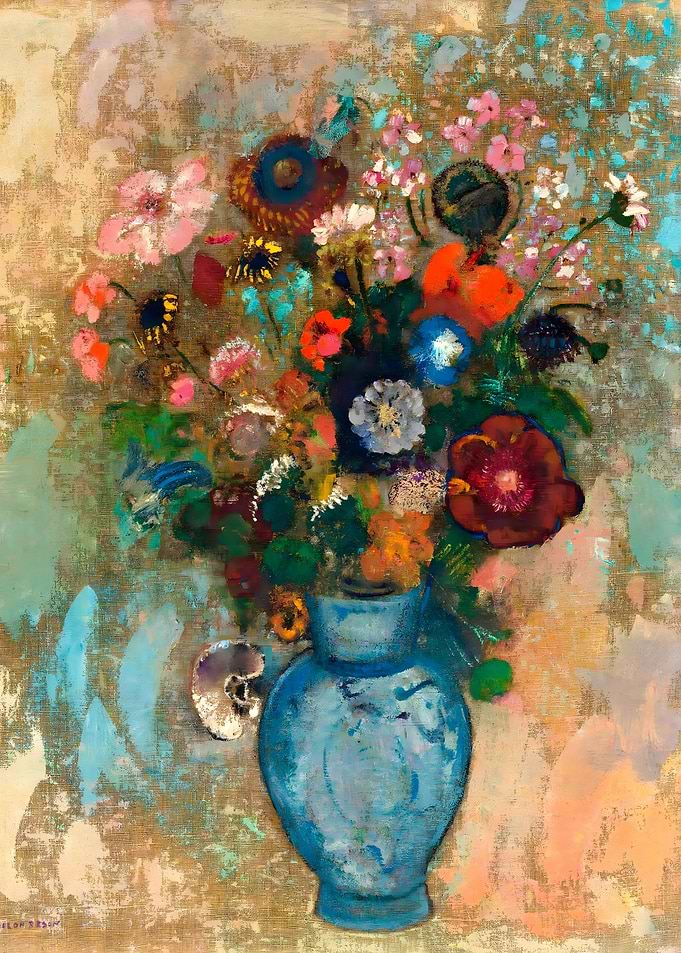 Fleurs dans un vase bleu