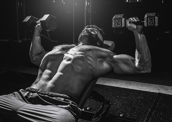 Man workout dumbbell