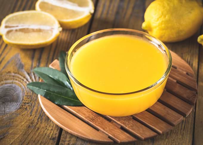Glass bowl of lemon curd