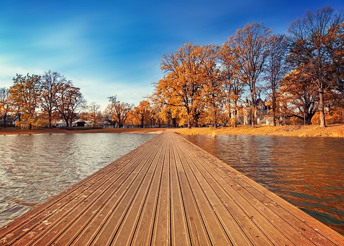 Autumn pier on the lake