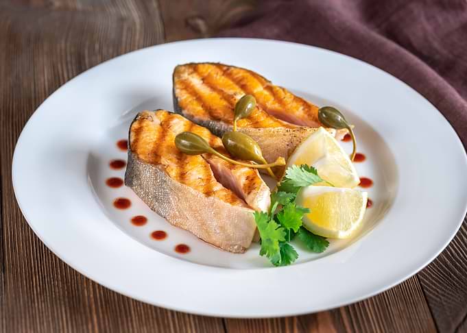 Grilled steaks of char