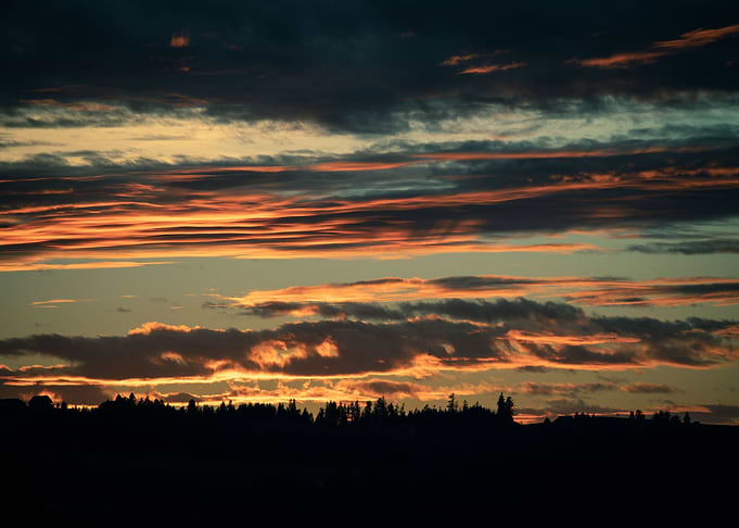 a sunset with clouds