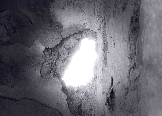 Hole in ruined wall artist