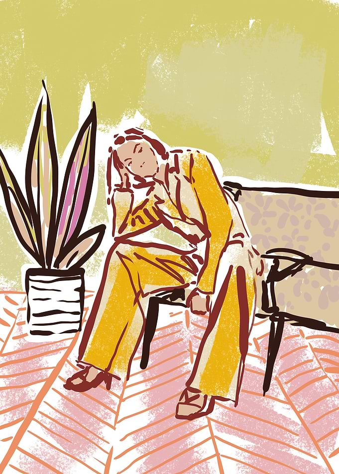Woman sitting on sofa