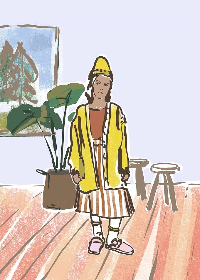 Girl with yellow cardigan