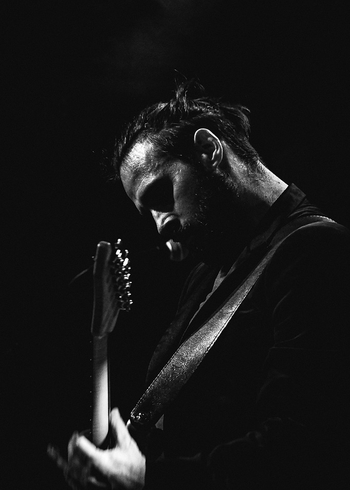 Black and white guitarist