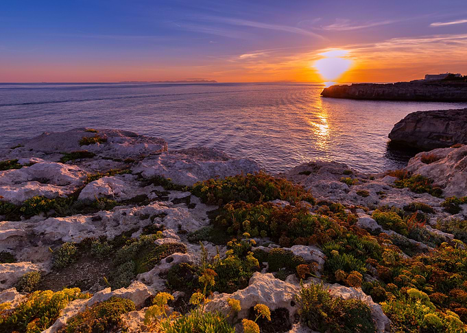 Sunset and cliff sea coast