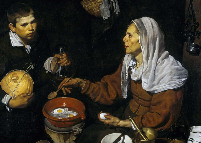 An old woman cooking eggs