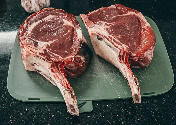 raw beef rib eye steak