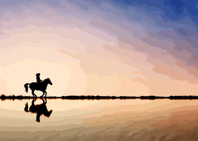 riding a horse in nature