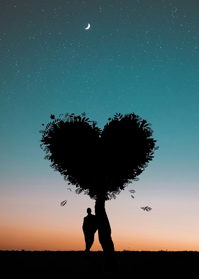 Man Leaning on Heart Leaf