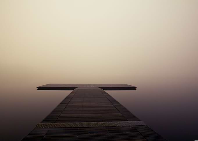 Wooden pier in the fog