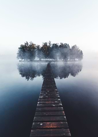 Wooden bridge in fog