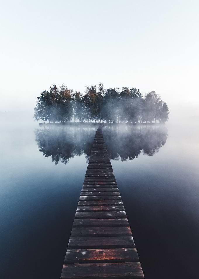 Wooden bridge in fog