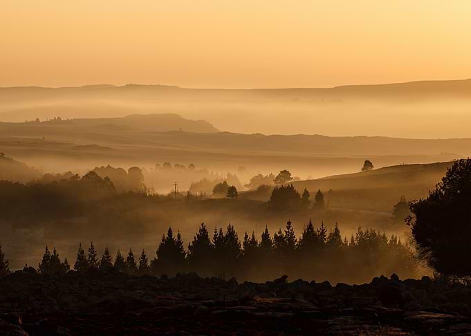 Sunset Over Misty Hills