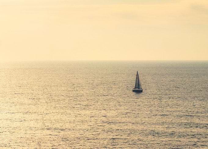 Sailing boat in the ocean
