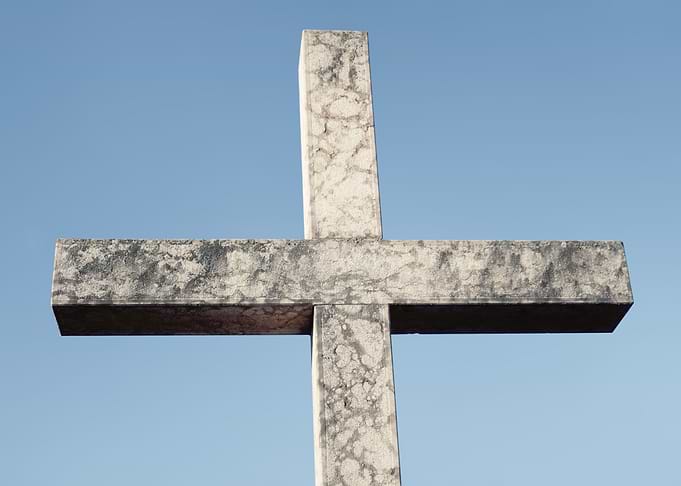 Cross stone below day