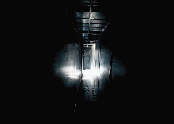 Dark room exit far