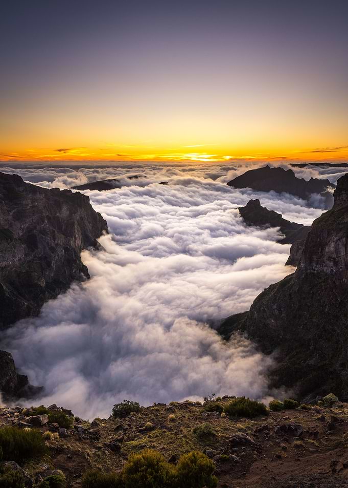 Sunset over the clouds