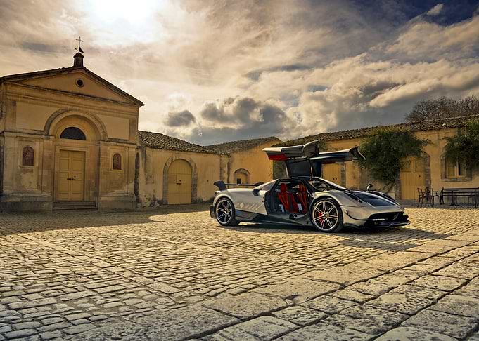 Pagani Silver Supercar in Courtyard