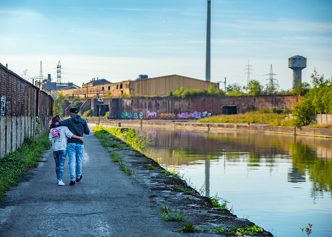 Couple Walking by Canal