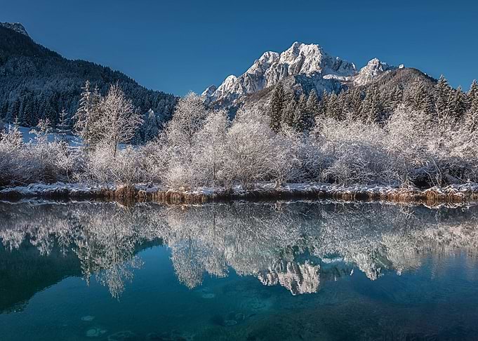 Snowy Mountain Reflection