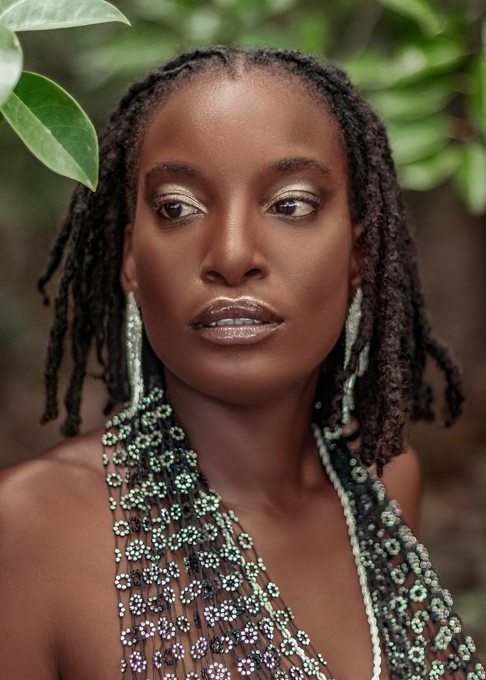 Woman with Beaded Necklace