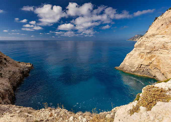 Coastal Cliffs and Azure Sea in Greek Island