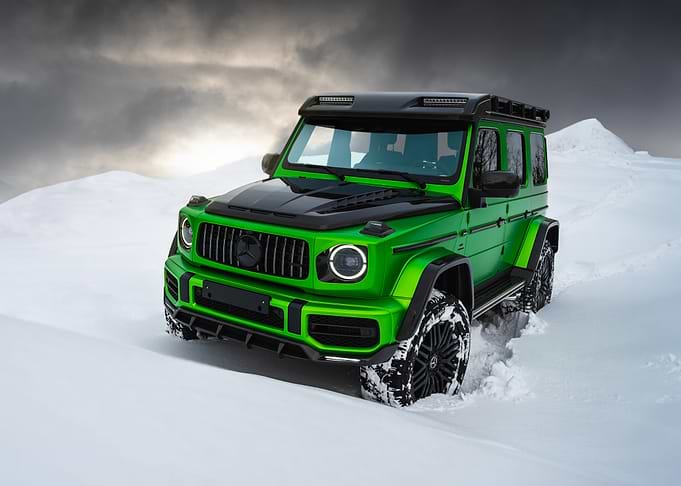 Green Mercedes G-Wagon in Snow