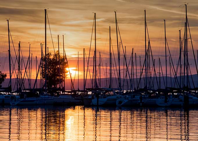 Sunset Sailboats