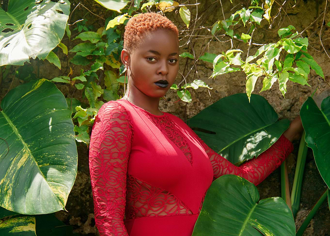 Woman in Red Dress by Lush Greenery
