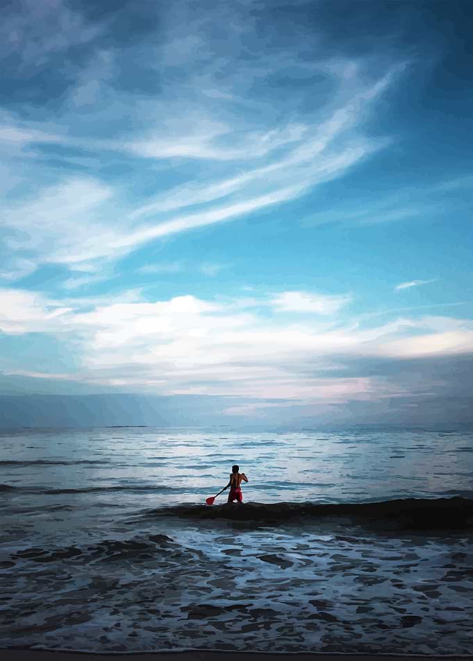 Man Paddleboarding at Suns