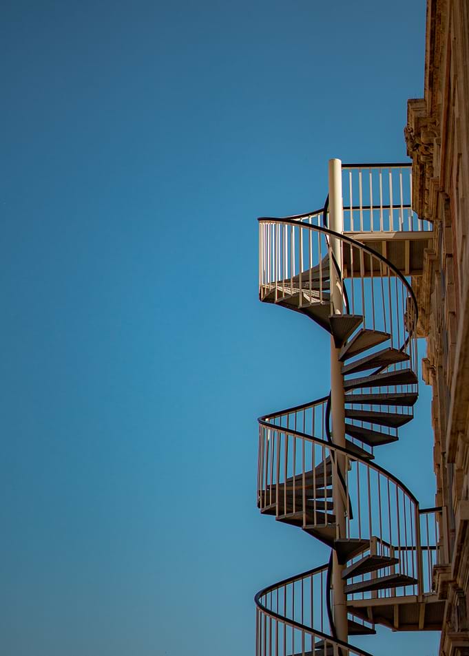 Spiral Staircase Against Blue Sky