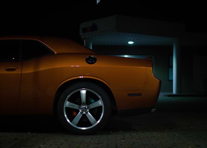 Orange Dodge Challenger at Night