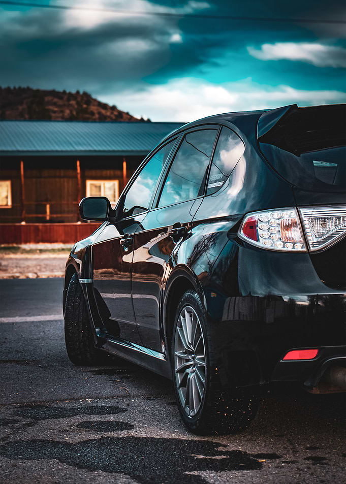 Black Subaru Impreza WRX Hatchback