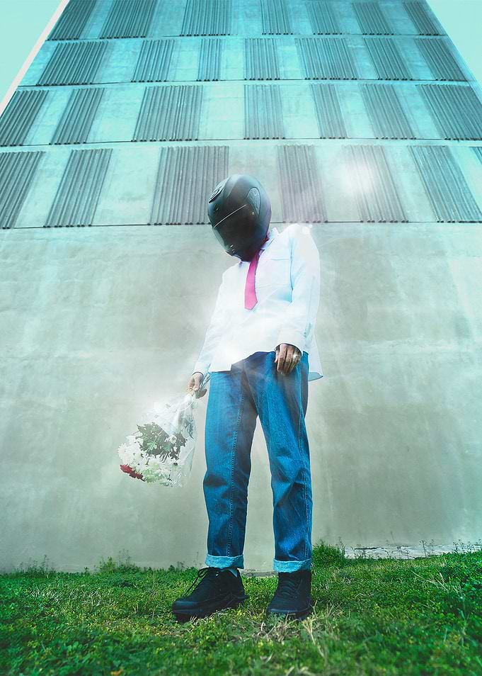 Man in Helmet with Flowers