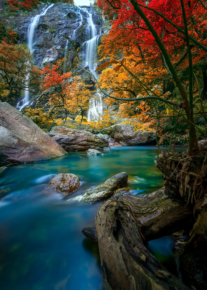 Beautiful Khlong Lan waterfall autumn forest