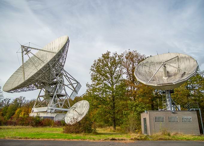 Satellite Dishes in Field