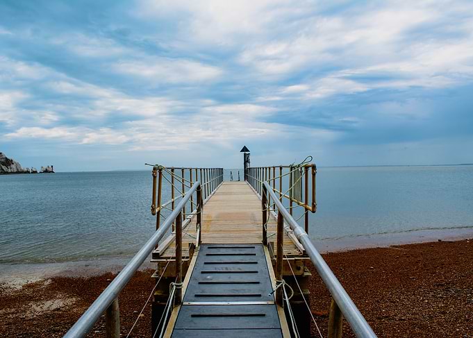 Wooden Pier Over Calm Water
