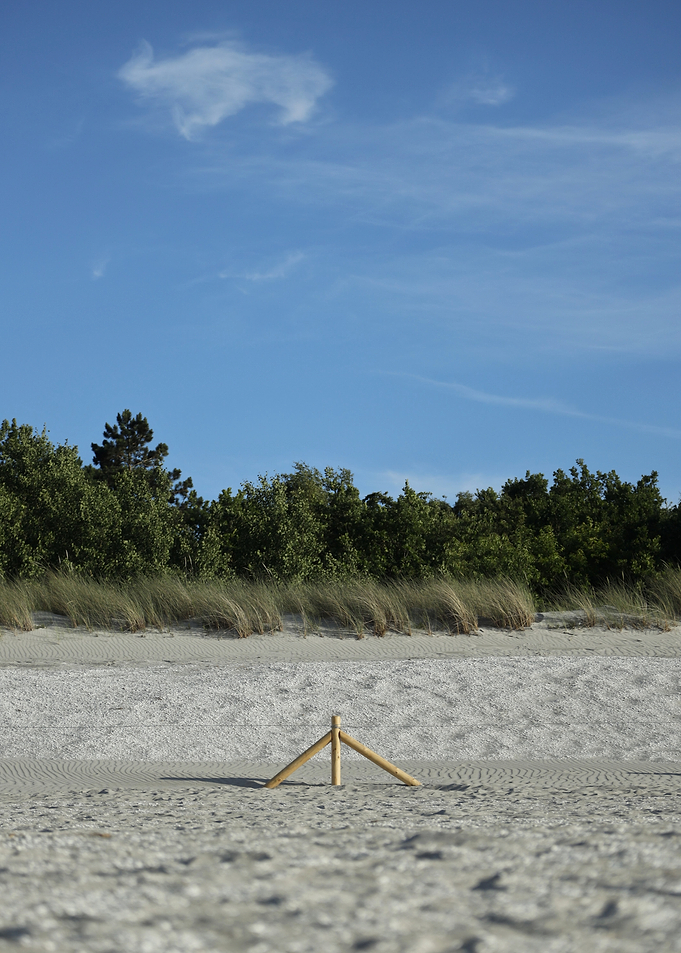 Wooden Fence on Sandy Beach
