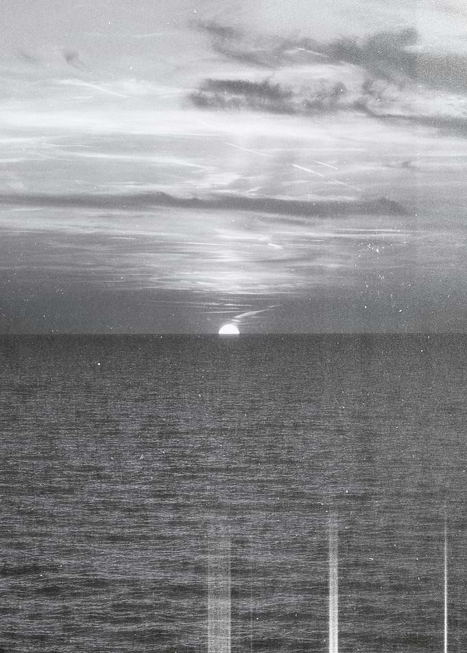 Grainy Sunset Over Water