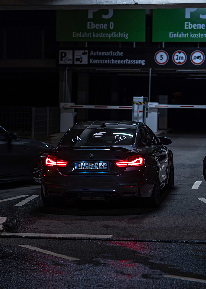 Grey BMW M4 in Parking Garage