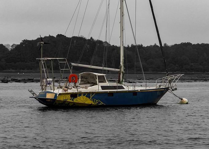 Blue Sailboat with Yellow Design